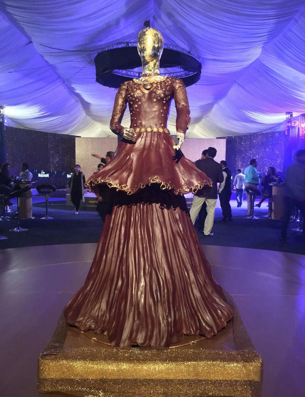 Magnum Ice Cream had carving artist Paul Joachim create chocolate sculpture of a dress.