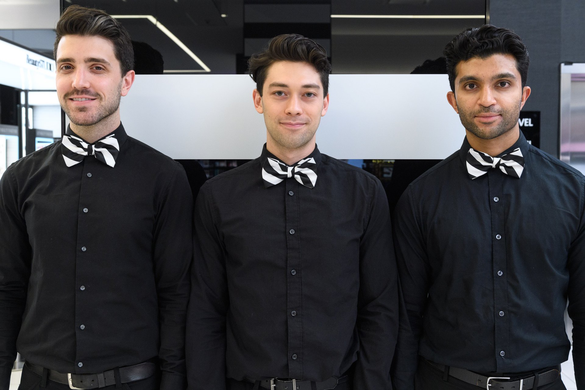 Three men pose at a Sephora event. Staffed Inc recruits from the LGBTQ community, creating job opportunities where there once weren't many. 
