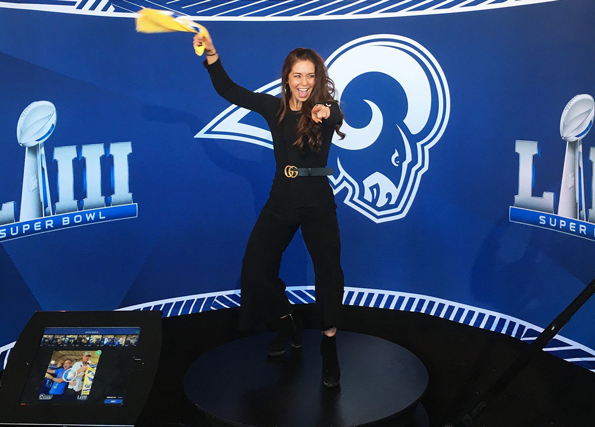 Guest poses for 360 photo booth built by OrcaVue at Super Bowl LIII. 