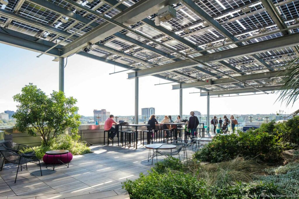 Rooftop space with covered area and lots of greenery