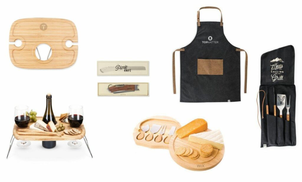 A collection of food related gifts including an apron, cheese board and wine opener