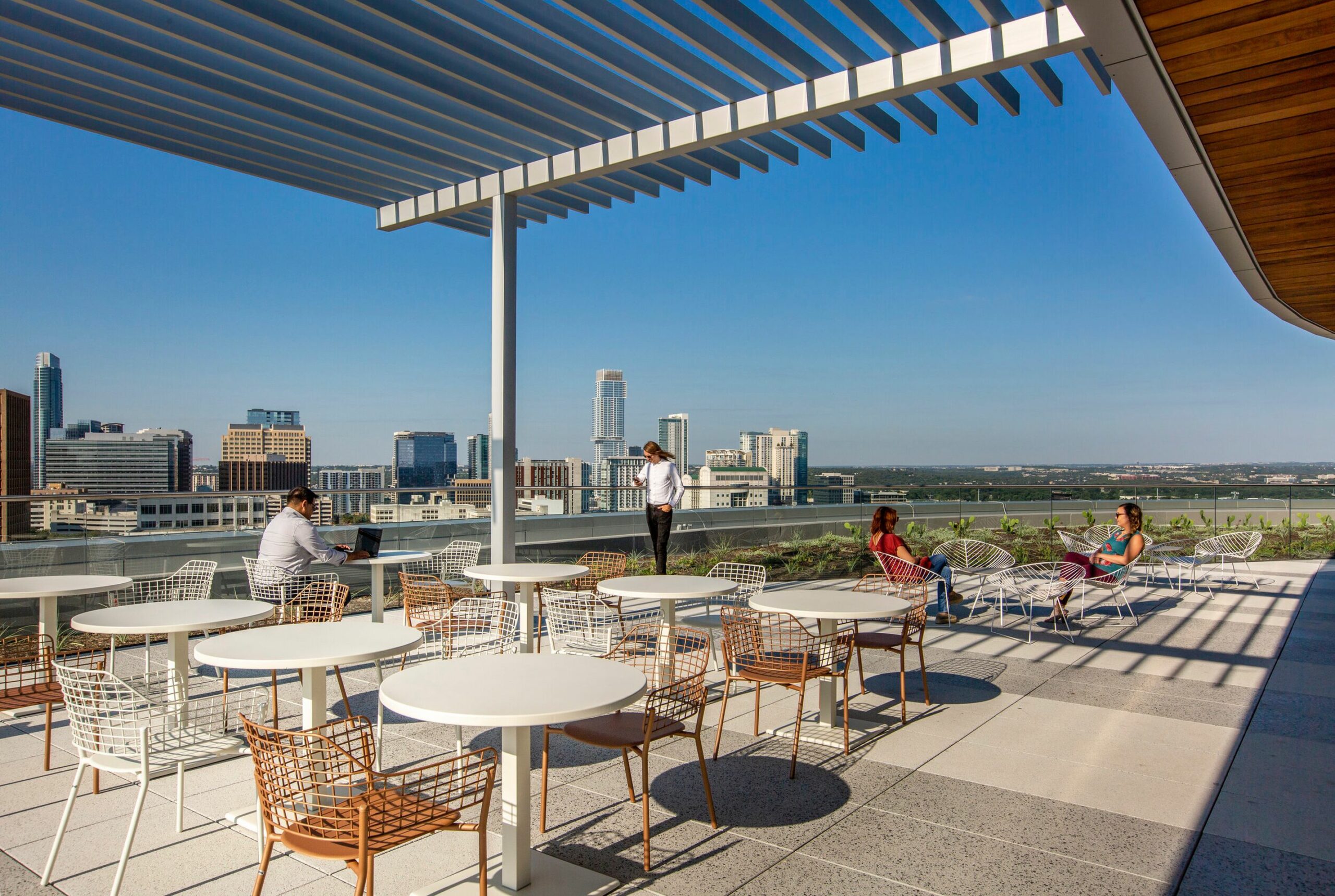 Expansive rooftop with table and chairs