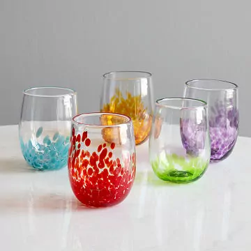 A set of five glasses in different colors.