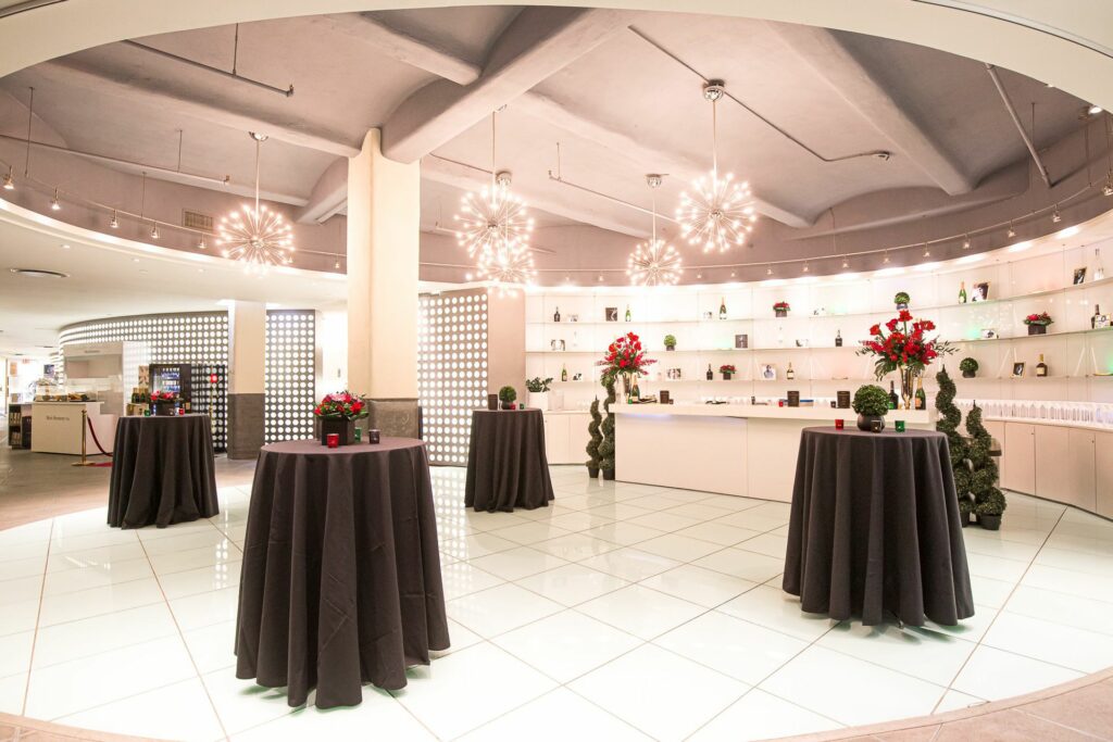 A black and white circular room dressed fro an event