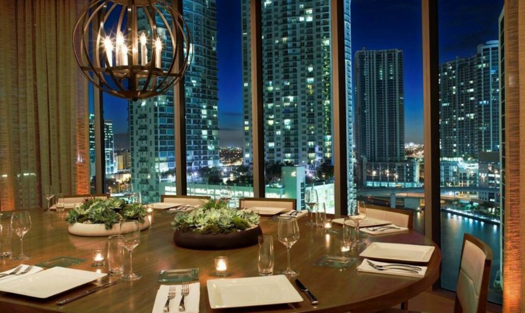 Circular table overlooking the Miami waterfront 