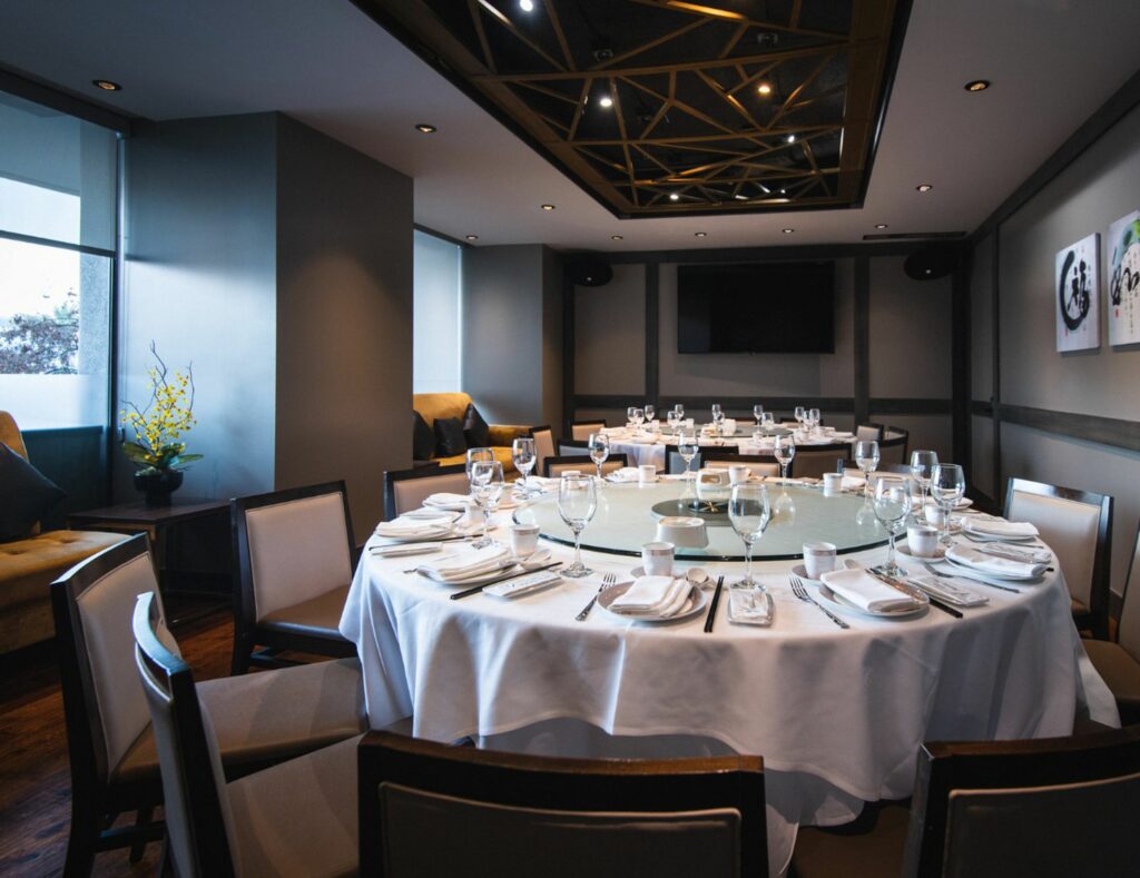 Large circular tables with white linens