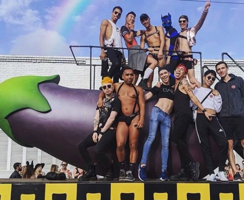 Grindr Pride parade people on float