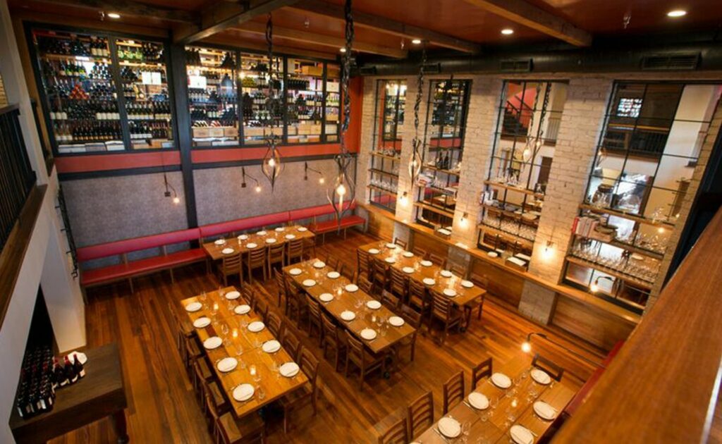 Republique dining room in Los Angeles with white brick walls and industrial vibe 