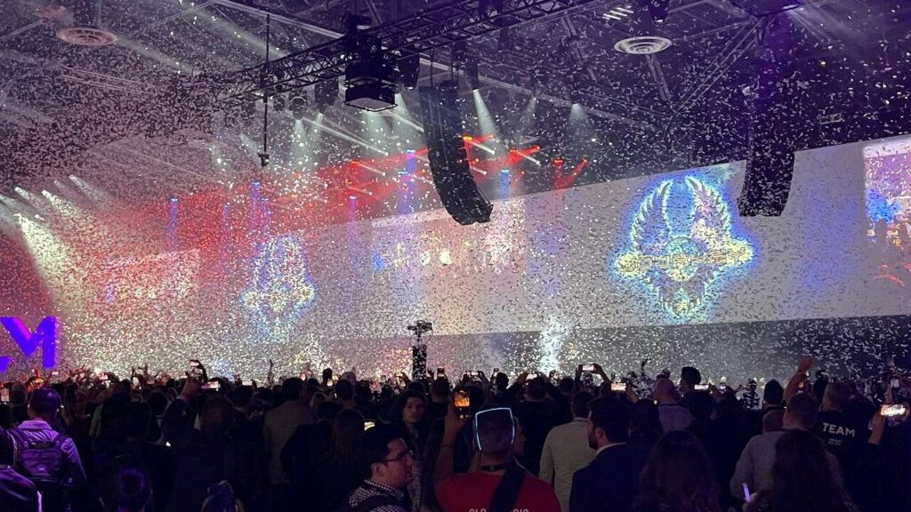 Large event with confetti coming from the ceiling 