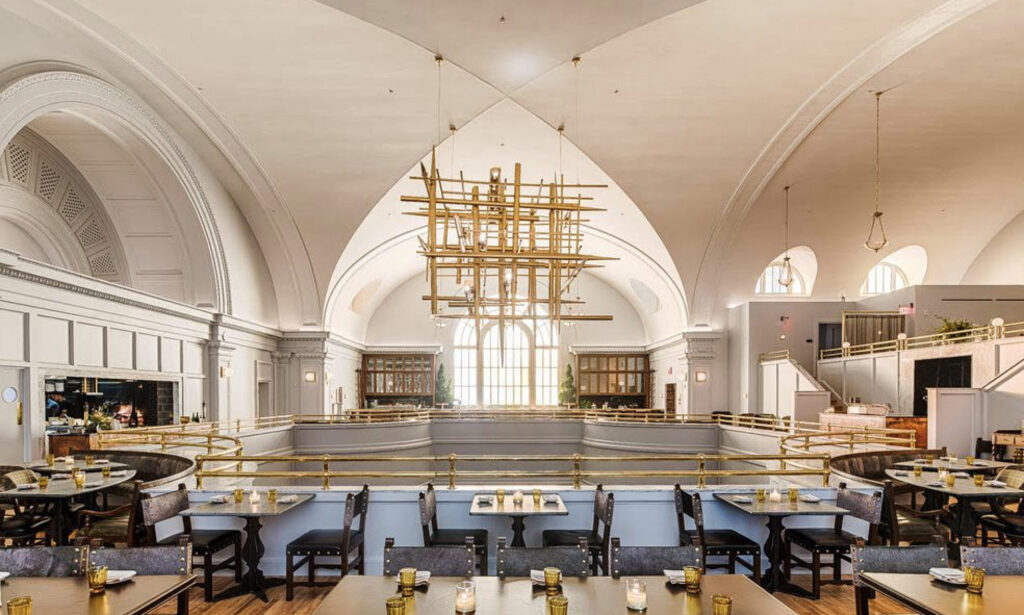 Vaulted ceilings and restaurant seating at The LINE Hotel 