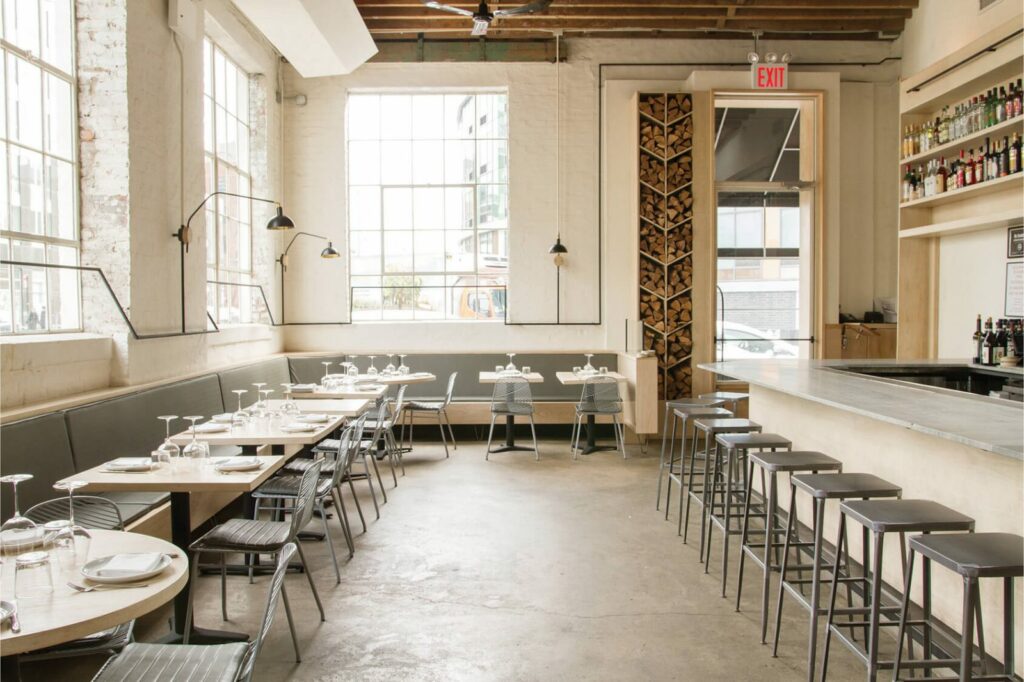 Lilia in Williamsburg with large windows and sleek décor