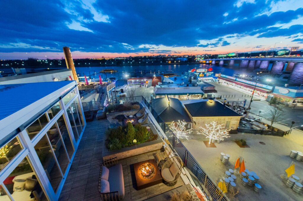 The rooftop of Officina at The Wharf in Washington D.C. at night