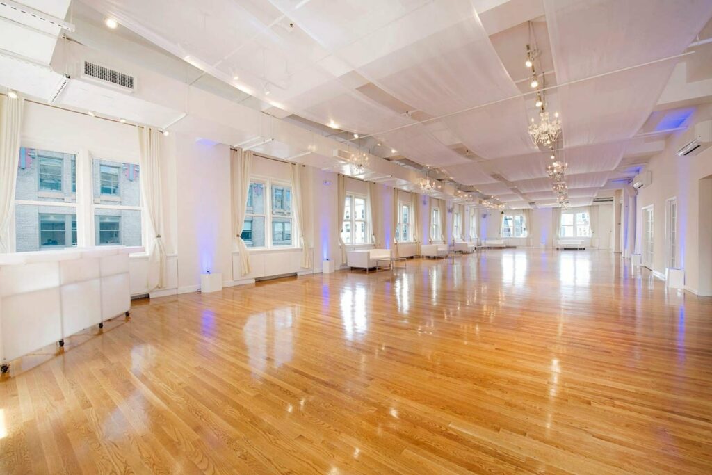 Midtown Loft and Terrace in NYC with wooden floors and many windows