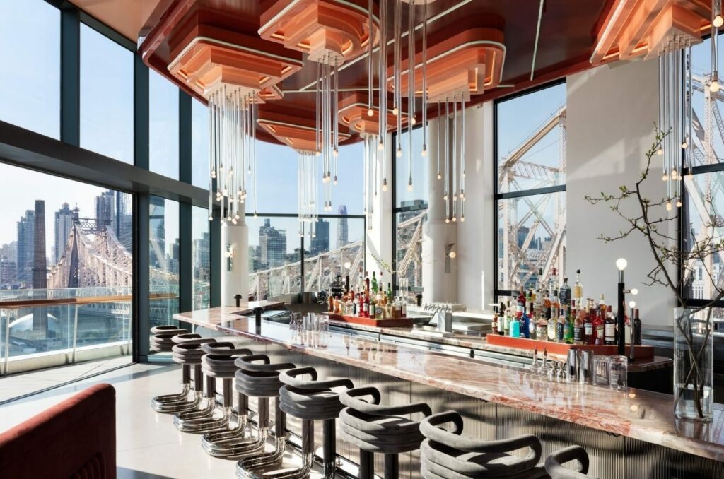 Panarama room rooftop lounge with city view of Manhattan and Queens