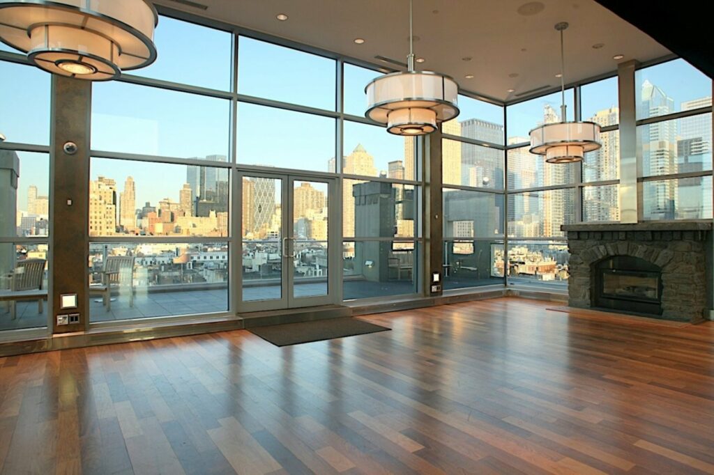 Penthouse 45 New York City with floor to ceiling windows and natural light