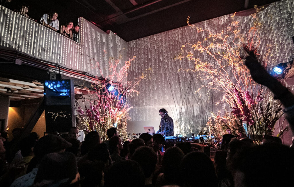 Large event space at Pier 27 in San Francisco with a DJ playing music