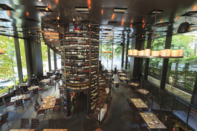 Purple Cafe and Wine Bar in Seattle with a large spiral staircase wine bar
