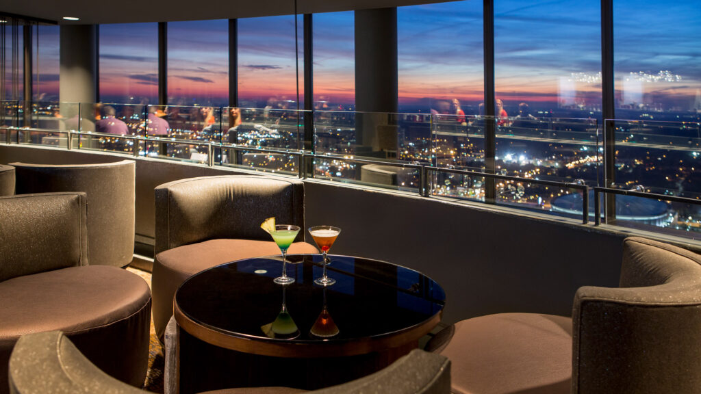 Sun Dial Restaurant Atlanta Rooftop  inside area with skyline view 