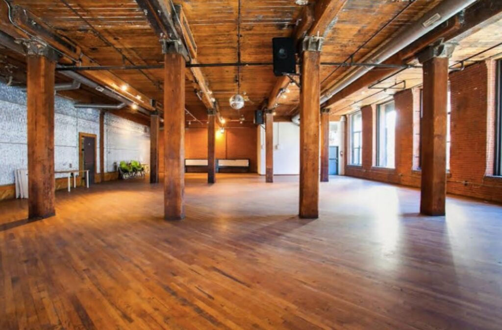 The Dumbo Loft in NYC with wood beams and wood flooring
