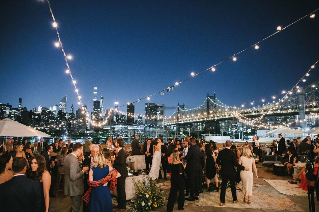 The Bordone Long Island City terrace with city view at night 