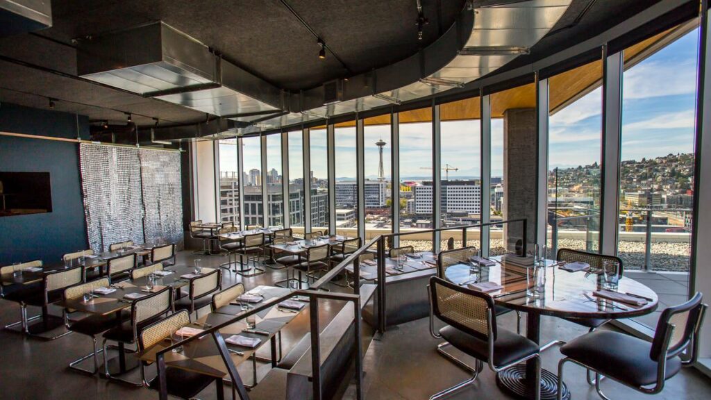 mbar in Seattle with floor to ceiling windows and views of Seattle