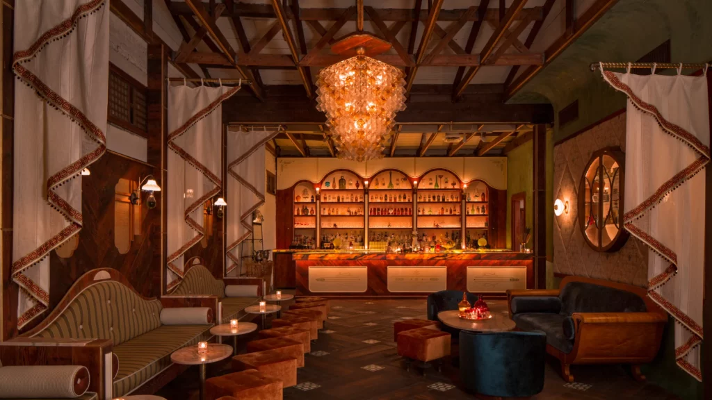 Apotheke Los Angeles indoor raw space with chandelier and bar
