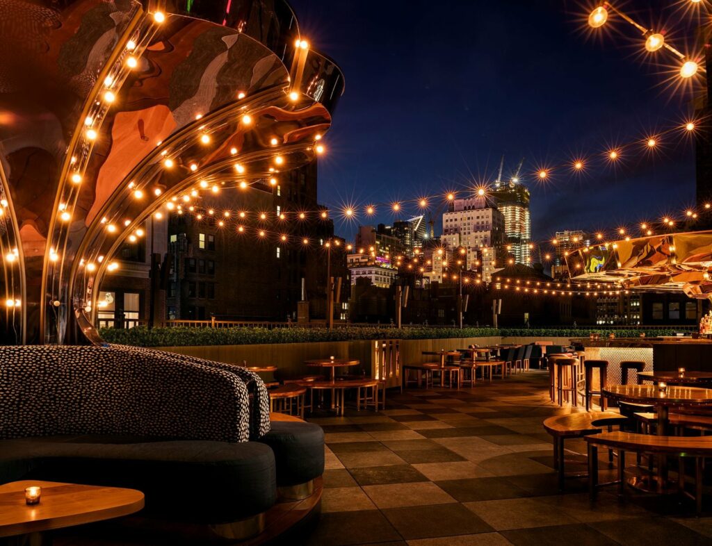 Magic Hour Rooftop in NYC at night with string lights