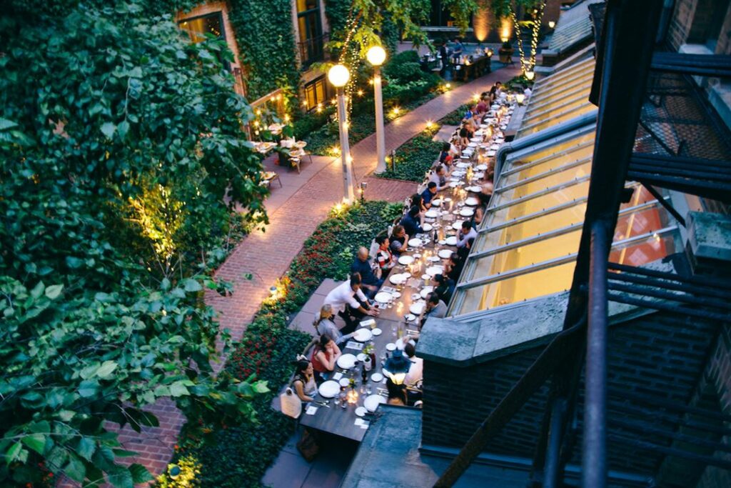 The Ivy Room in Chicago with an outdoor space featuring a long dining table