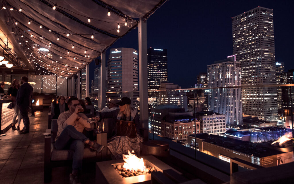 54thiry Denver rooftop with city skyline view at night