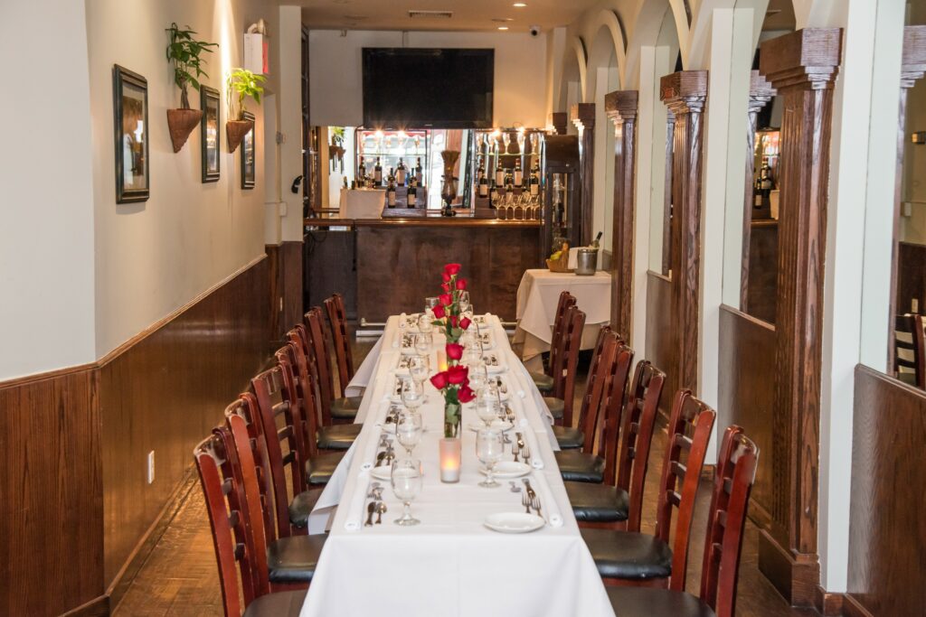 II Punto Ristorante dining room with long dining table