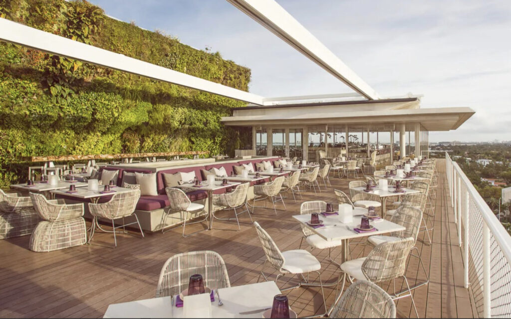 Juvia in Miami with an expansive rooftop deck and dozens tables and chairs