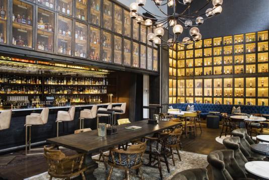 Library of distilled spirits bar and restaurant with wine wall
