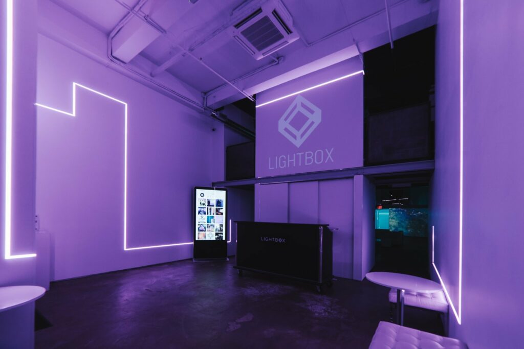 Lightbox venue with purple lighting
