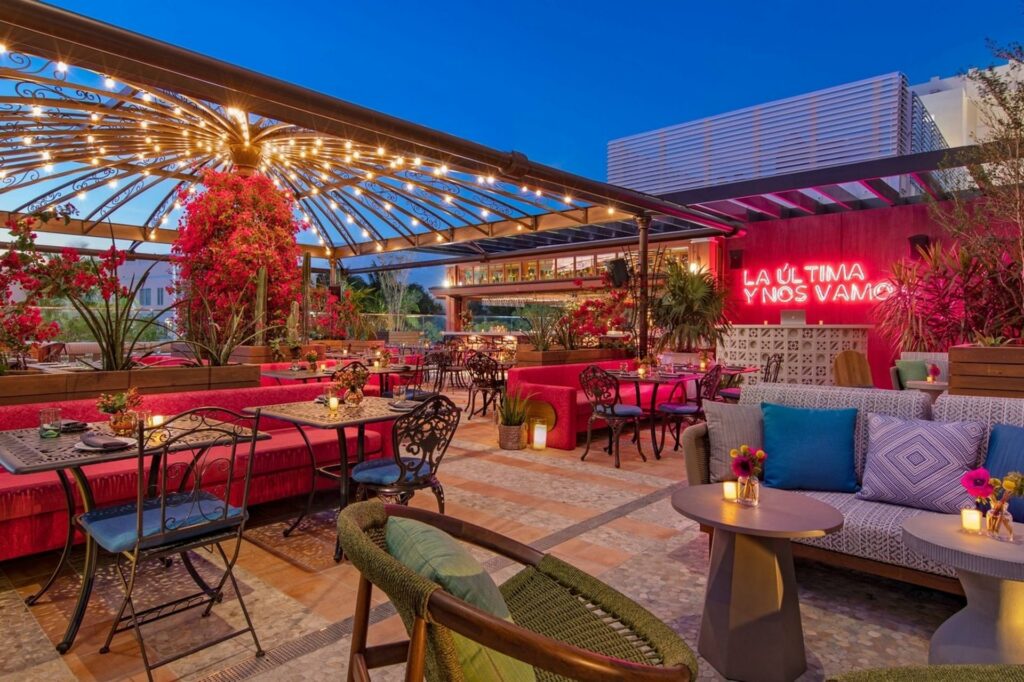 Moxy Miami South Beach on the roof with eclectic furniture.