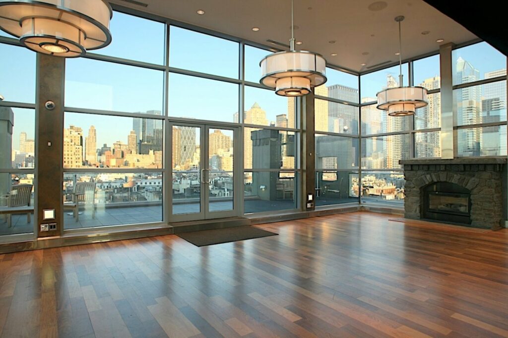 Penthouse 45 venue with large windows, city view, and chandeliers