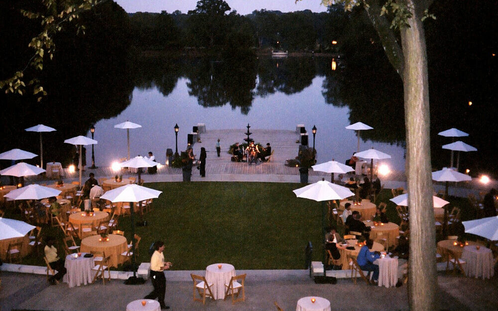 Greystone at Piedmont Park Conservancy outdoor venue space the dock with white umbrellas