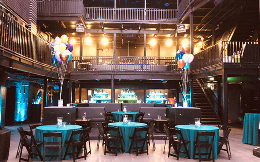 Temple Denver venue space with two stories and balloons
