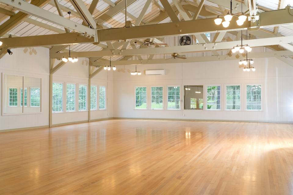 Large open venue space with wooden floors
