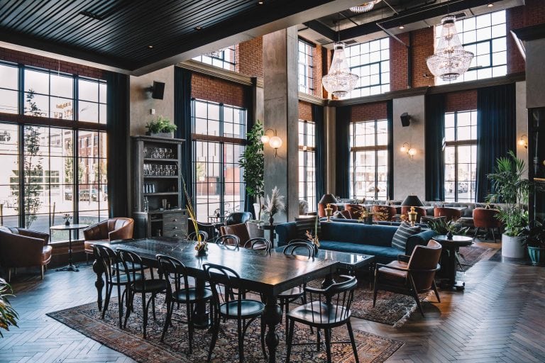 Vauxhall Denver event space with large windows and chandeliers