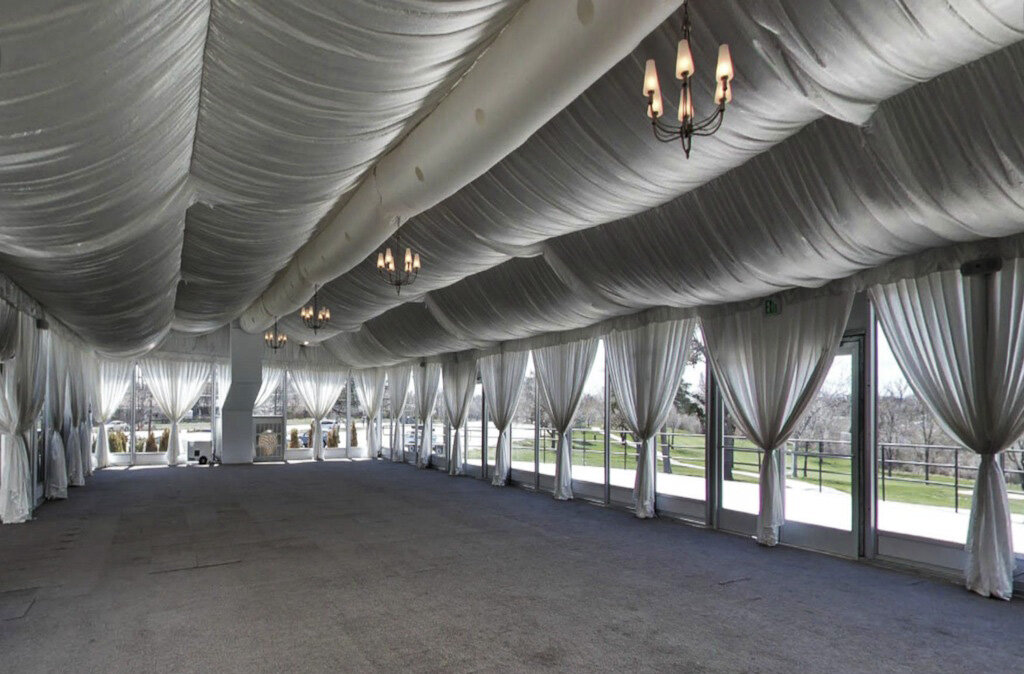 Wellshire Inn Denver corporate event space with canopy ceilings and windows