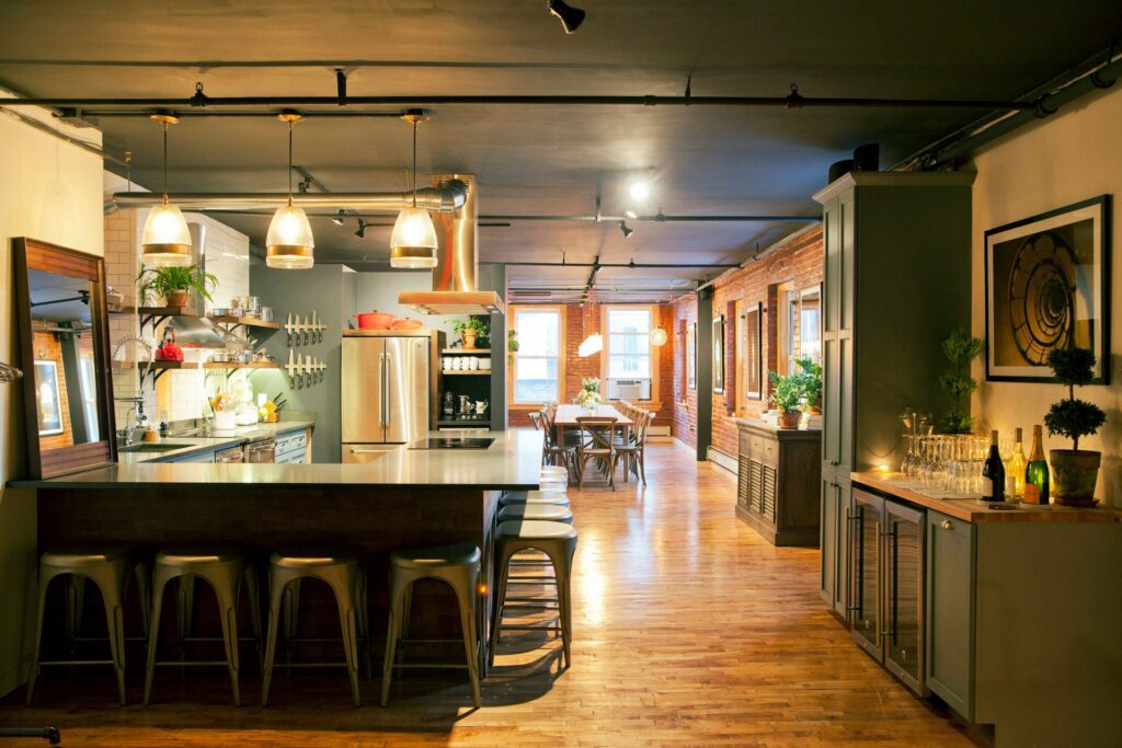 Chef's Dinner table's private dining rooms in nyc with a private kitchen, brick walls, and green furniture.