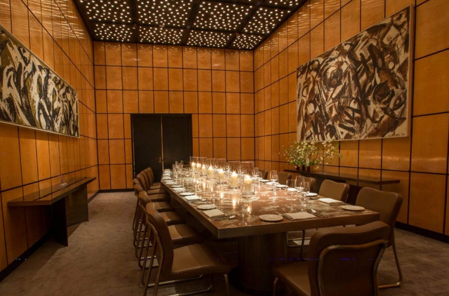 NYC Acclaimed Restaurant The Grill's private dining room with dim lighting