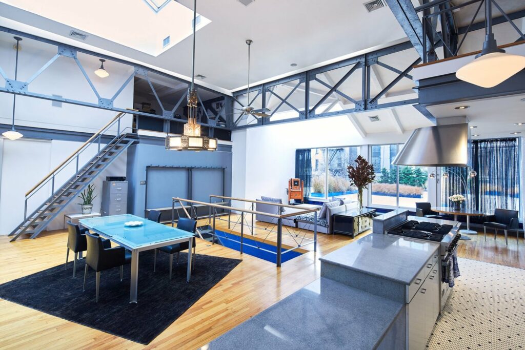 Loft like venue space with a large skylight and modern design