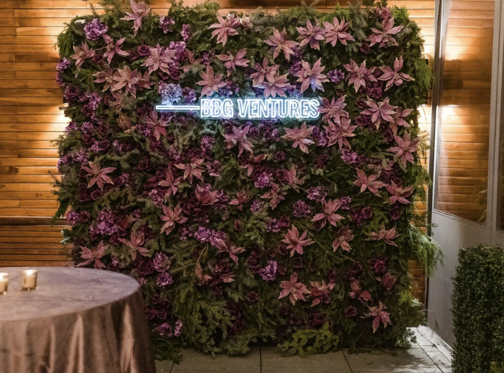 Floral wall at Aretsky's Patroon that says "BBG Ventures"