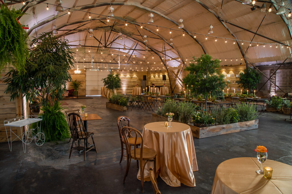An event space with a dome ceiling, beautiful exposed brick walls and a cozy lighting