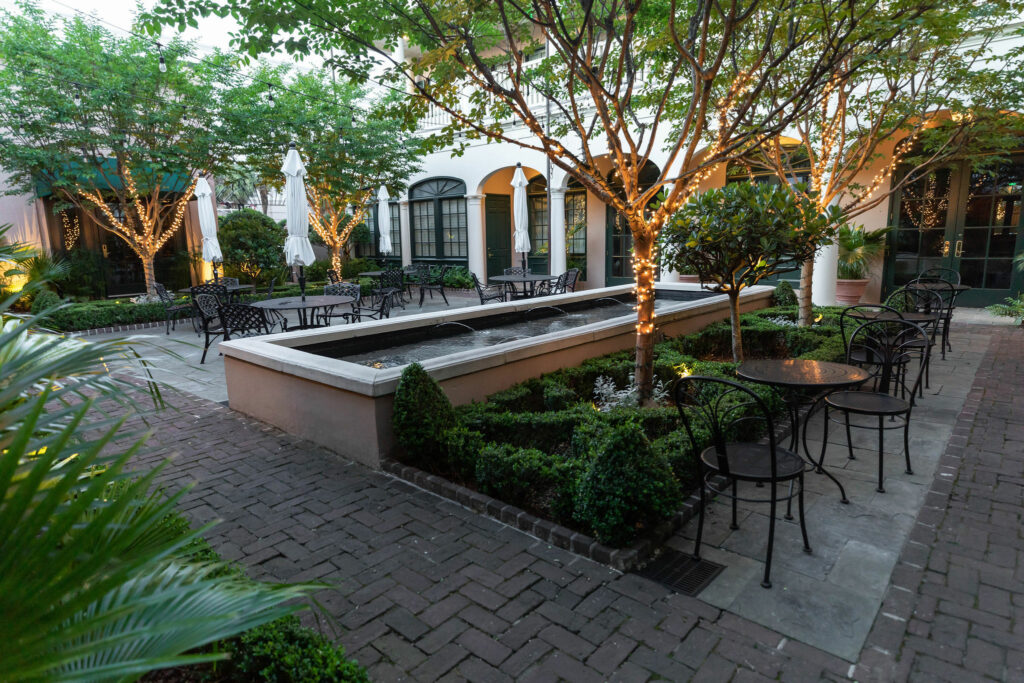 A courtyard with charming lightings and a mini fountain