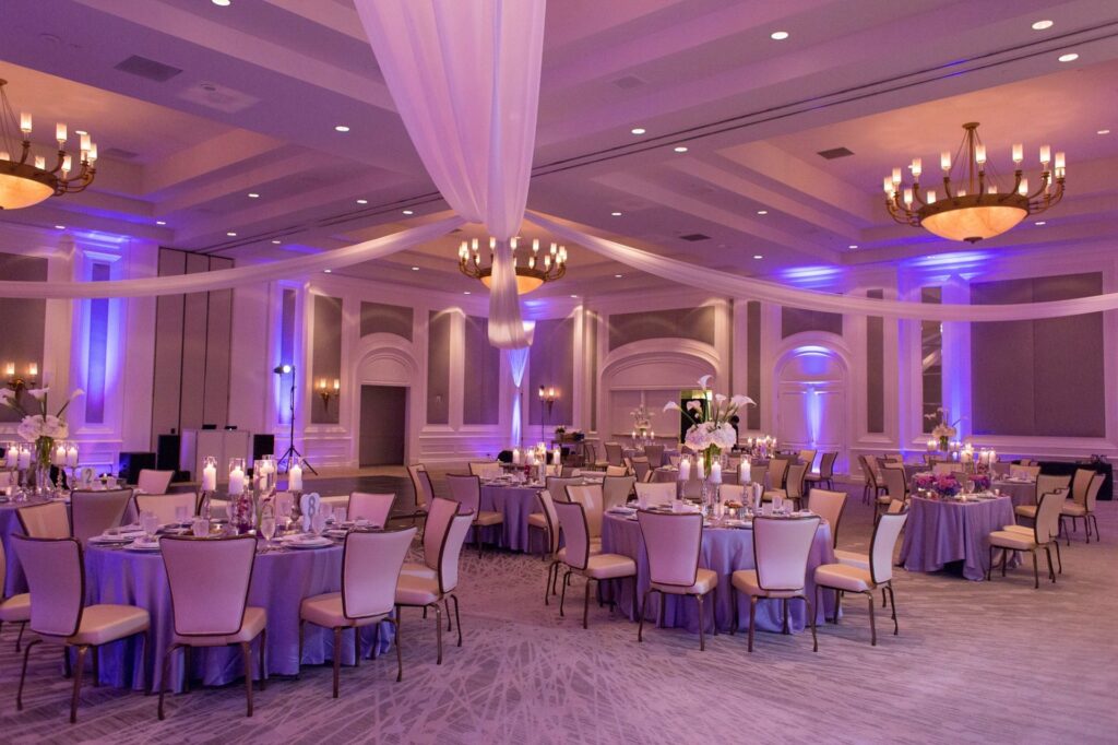 A warmly decorated, pillar less ballroom featuring state-of-the-art staging and audiovisual capabilities