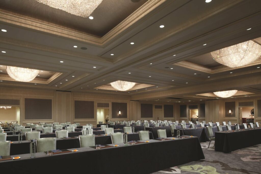 A huge ballroom with an elegant design, and plenty of lighting 